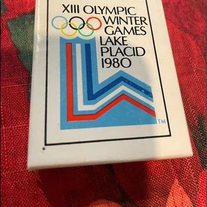 XIII Winter Olympic pewter skating raccoon